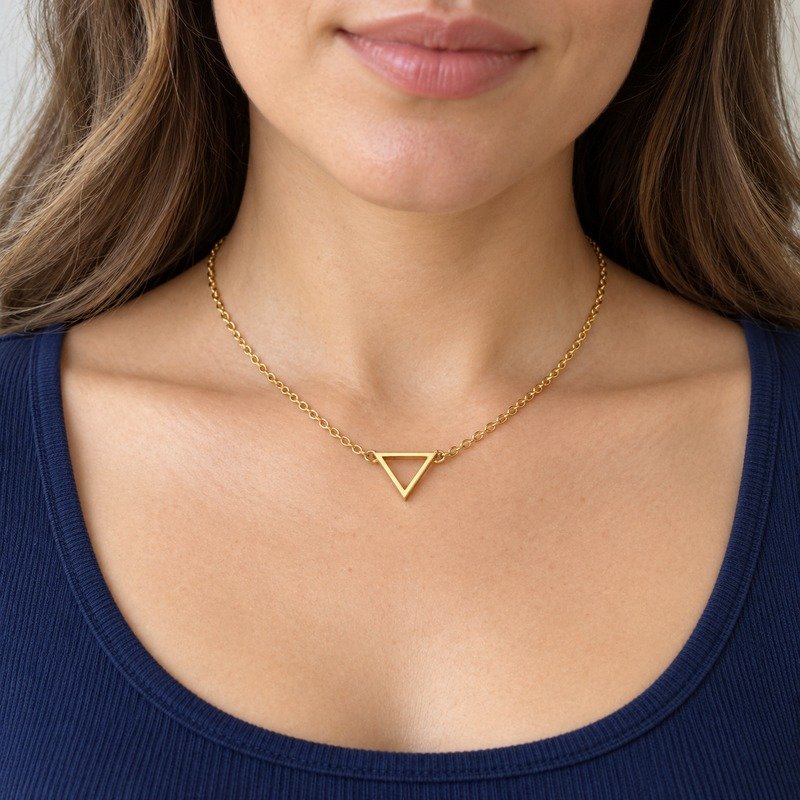 womens gold Stainless Steel triangle necklace, worn by an adult model