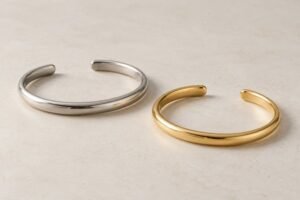 Illustrative Silver- and gold-tone open cuff bracelet concepts