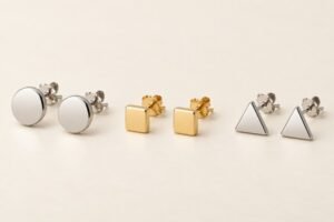 Round, square and triangular stud earring pairs