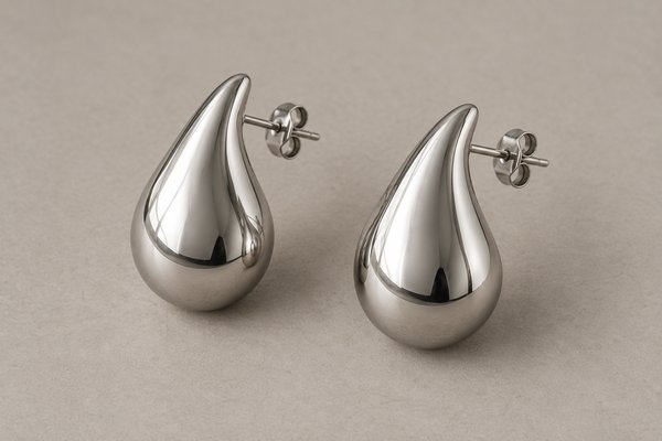 Silver sculptural statement earrings for wholesale jewelry collections